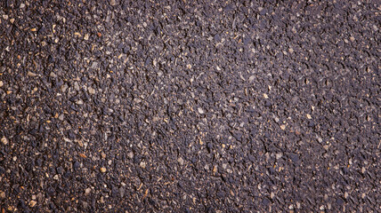 Wet asphalt is a perfect background with space for text or images.