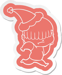 cartoon  sticker of a boy with untidy hair wearing santa hat