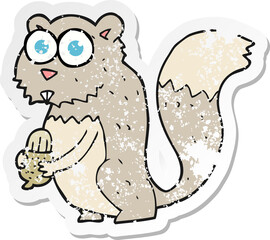 retro distressed sticker of a cartoon angry squirrel with nut