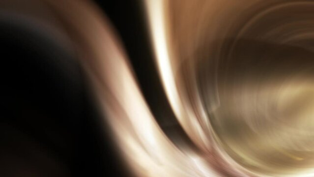 Slow motion abstract golden striped on a spiral shaped moving on a slow pace