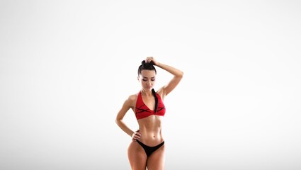 Young happy fitness sports girl posing