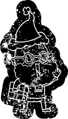 cartoon distressed icon of a joyful man with beard and parcel under arm wearing santa hat