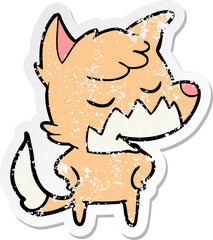 distressed sticker of a friendly cartoon fox