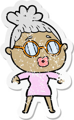 distressed sticker of a cartoon woman wearing spectacles