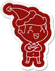 cartoon  sticker of a laughing man wearing santa hat