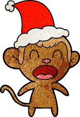 shouting textured cartoon of a monkey wearing santa hat