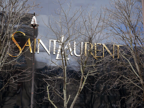 Luxury store window, avenue Montaigne in Paris. Front of the new Yves Saint Laurent boutique. Opening in 2023