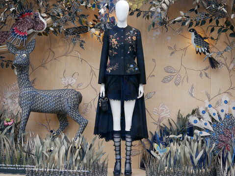 Luxury store window, avenue Montaigne in Paris. Dior, spring collection 2023. Women fashion