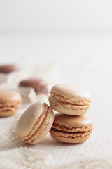 Colorful pastel eco handmade natural macaroons on white table. Gift for 8 March, International Women's Day, Valentine Day