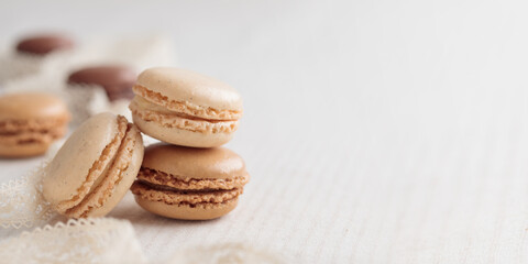 Colorful pastel eco handmade natural macaroons on white table. Gift for 8 March, International Women's Day, Valentine Day