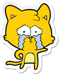 sticker of a cartoon crying cat