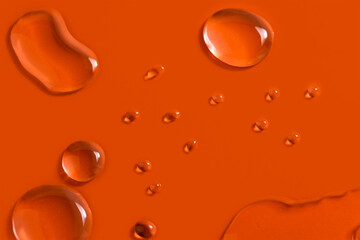Water drops on orange background
