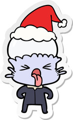weird sticker cartoon of a alien wearing santa hat
