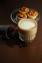 Hot coffee and coffee beans and grain tarts