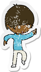 retro distressed sticker of a cartoon worried boy pointing