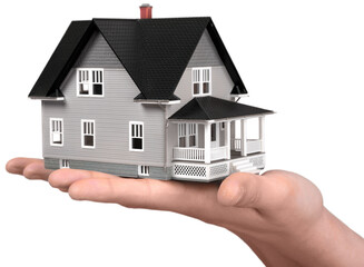 Building, mortgage, real estate and property concept - close up of hand holding house model