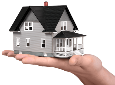 Building, mortgage, real estate and property concept - close up of hand holding house model