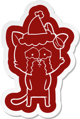 cartoon icon of a cat wearing santa hat