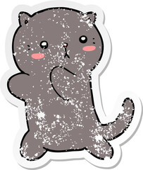 distressed sticker of a cute cartoon cat