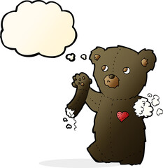 cartoon teddy black bear with torn arm with thought bubble