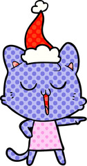 Obraz na płótnie Canvas comic book style illustration of a cat singing wearing santa hat