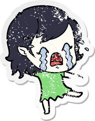 distressed sticker of a cartoon crying vampire girl