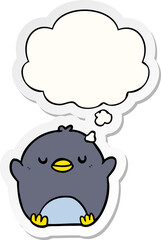 cartoon penguin and thought bubble as a printed sticker