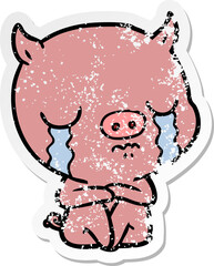 distressed sticker of a cartoon sitting pig crying
