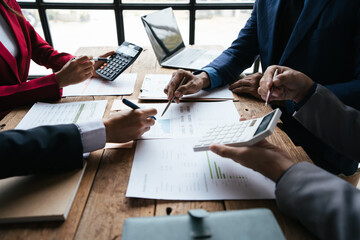 business adviser meeting to analyze and discuss the situation on the financial report in the meeting room.Investment Consultant, Financial advisor and accounting concept