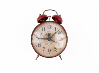 vintage rusty alarm clock isolated on white background