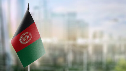 A small Afghanistan flag on an abstract blurry background