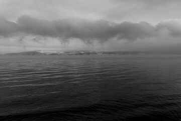 Fototapeta premium Calm vawes on Lake Mjøsa in winter.