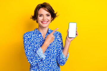 Photo of positive glad lady wear blue stylish clothes demonstrate qr code application empty space isolated on yellow color background