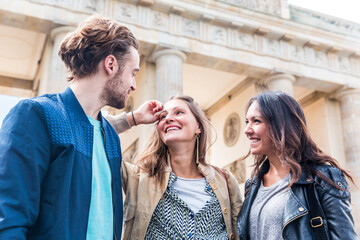Happy multiracial friends meeting and talking in Berlin © william87