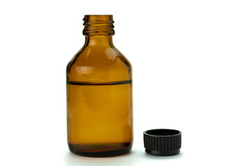 Brown glass medical bottle with liquid and black plastic cap,