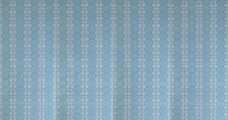 Old wallpaper on the wall. Old wallpaper for texture or background.