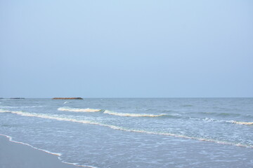 Naklejka na ściany i meble sea wave flowing to beach from chao Sam Ran beach travel location in Thailand