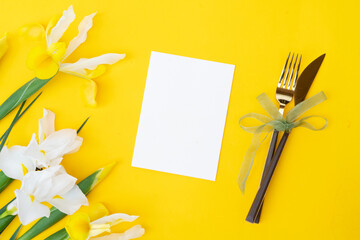 Iris flowers on yellow background