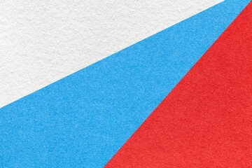 Fototapeta na wymiar Texture of old craft white, red and blue color paper background, macro. Structure of vintage abstract cardboard