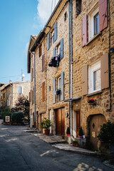 Fototapeta na wymiar Quaint stone facades of old houses in the medieval village of Boulieu Les Annonay in the south of France (Ardeche)
