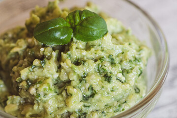 Close up of Pesto sauce made with avocados and basil