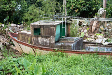 decaying abandoned wooden boat