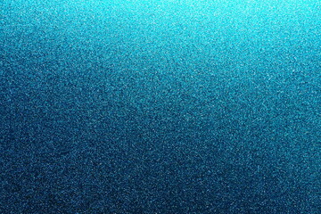Deep blue. Texture of rough paper or cardboard. Defocused bokeh sparkles and shining. Festive blue...
