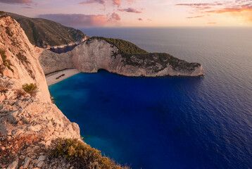 Fototapeta na wymiar Panoramic view of Navagio beach with the shipwreck in Zakynthos at sunset 