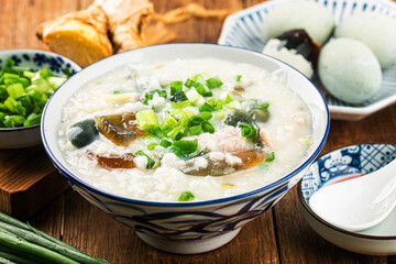 Rice preserved egg lean meat porridge，chinese rice porridge, chinese traditional healthy breakfast