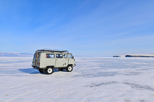 Vintage UAZ 452 or Bukhanka on Frozen Lake Baikal