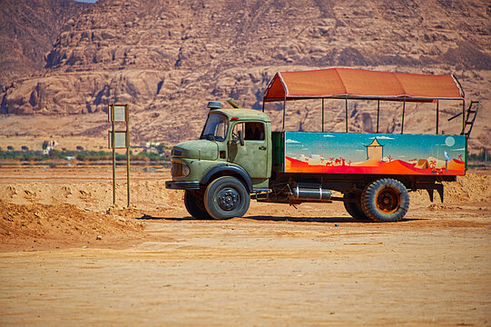 An old pick up truck, out of order in the desert