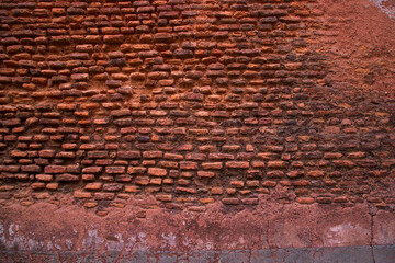 Old historical building brick wall grunge pattern texture can be used as a background wallpaper