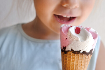 child 3 years old, going eat cold ice cream cone, strawberry dessert with fruit jam and chocolate,...