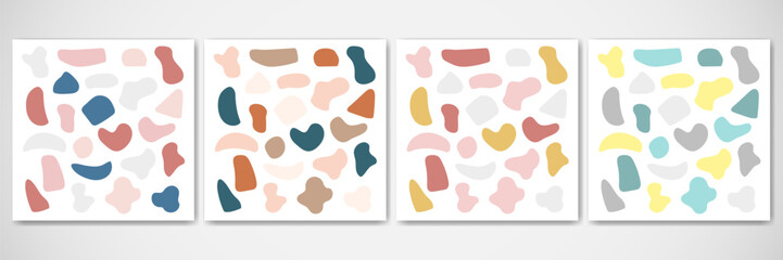 Abstract hand drawn stone shapes set. Multicolored collection of rounded spots or blobs in minimalist flat style. Basic vector elements for modern decor, background for text and logo, organic design.